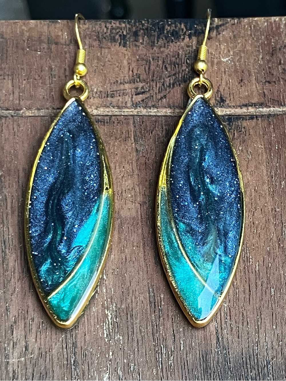 Blueish black and green Emerald Eclipse handcrafted elegant dangle earrings